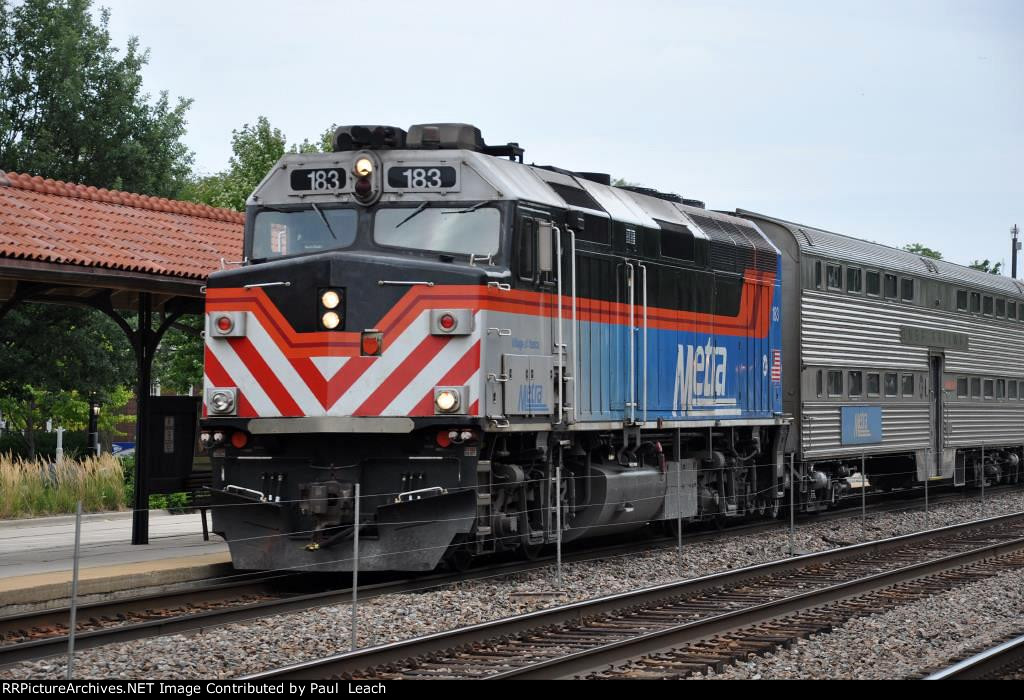 Westbound commuter comes into the station